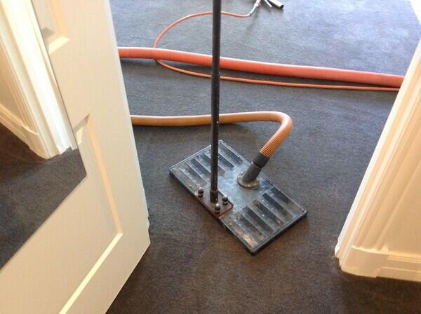 Extraction of water from carpet
